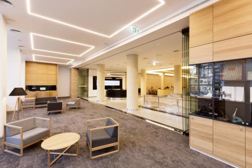 SIEBERT + TALAŠ, SPOL. S R.O. | REKONŠTRUKCIA POBOČKY SLOVENSKEJ SPORITEĽNE, NÁMESTIE SNP, BRATISLAVA